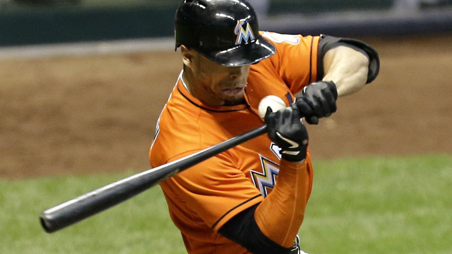 Marlins' Giancarlo Stanton introduces helmet with faceguard. MLB